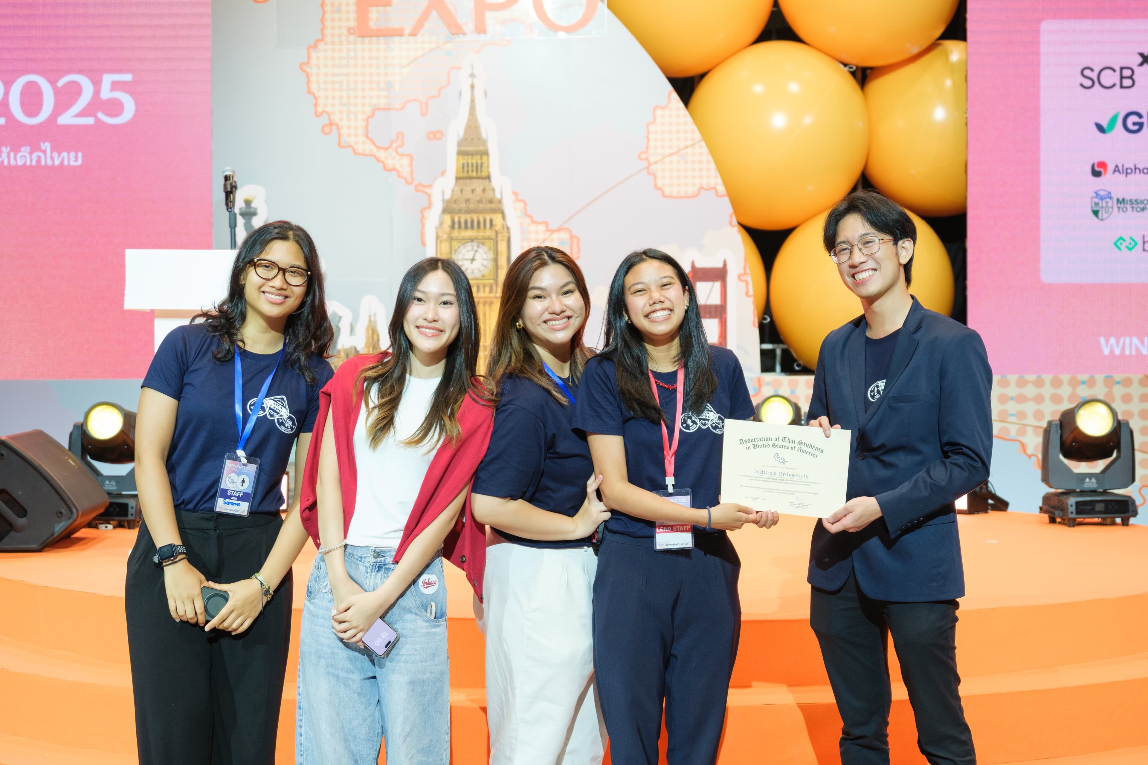 ATSA community members posing together with a certificate