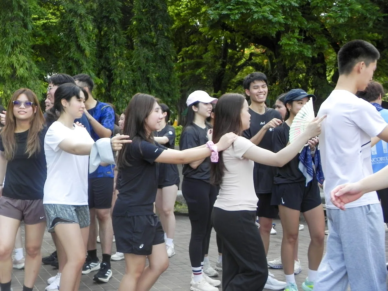 Participants joining a group activity after the run